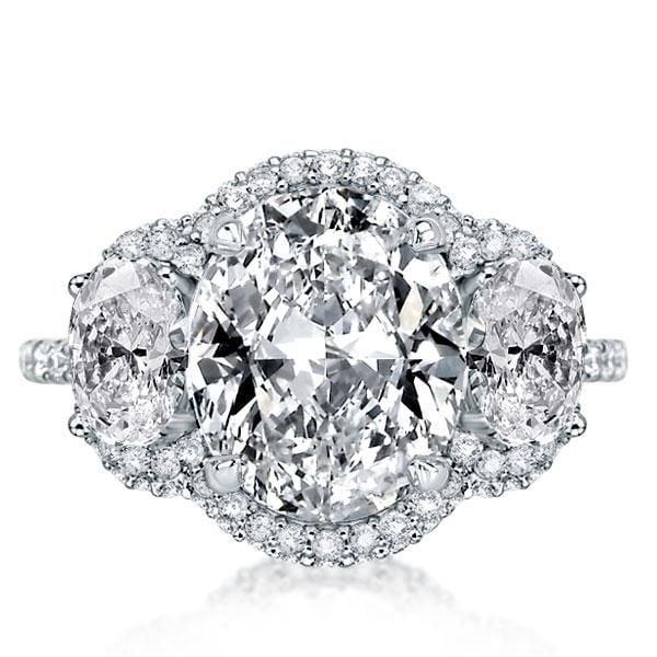 Oval White Sapphire Halo Three Stone Engagement Ring in Rhodium-Plated Sterling Silver