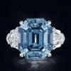 Emerald Cut Blue Topaz Three Stone Engagement Ring - Sterling Silver