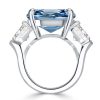 Emerald Cut Blue Topaz Three Stone Engagement Ring - Sterling Silver