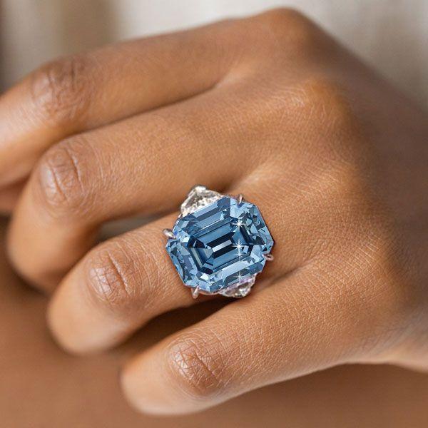 Emerald Cut Blue Topaz Three Stone Engagement Ring - Sterling Silver