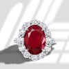 Oval Cut Garnet Halo Engagement Ring in Sterling Silver with Rhodium Finish