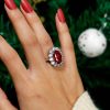 Oval Cut Garnet Halo Engagement Ring in Sterling Silver with Rhodium Finish