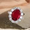 Oval Cut Garnet Halo Engagement Ring in Sterling Silver with Rhodium Finish