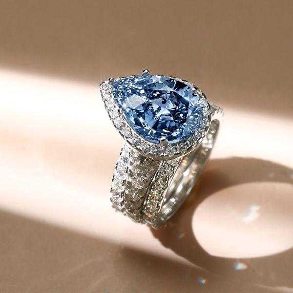 Halo Pear Cut Blue Topaz Engagement Ring Set - 925 Sterling Silver Bridal Set