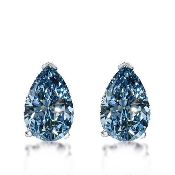Pear Shaped Blue Topaz Stud Earrings in 925 Sterling Silver with Rhodium Plating