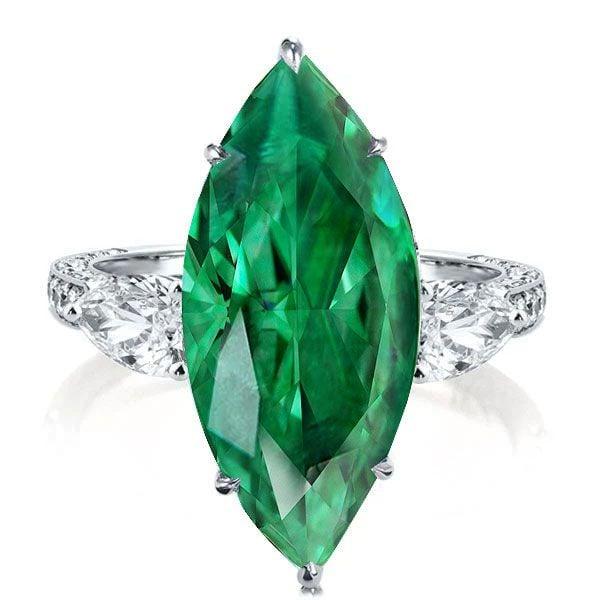 Emerald Cut Green Stone 3 Stone Engagement Ring in Rhodium Plated Sterling Silver