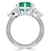 Emerald Cut Green Stone 3 Stone Engagement Ring in Rhodium Plated Sterling Silver