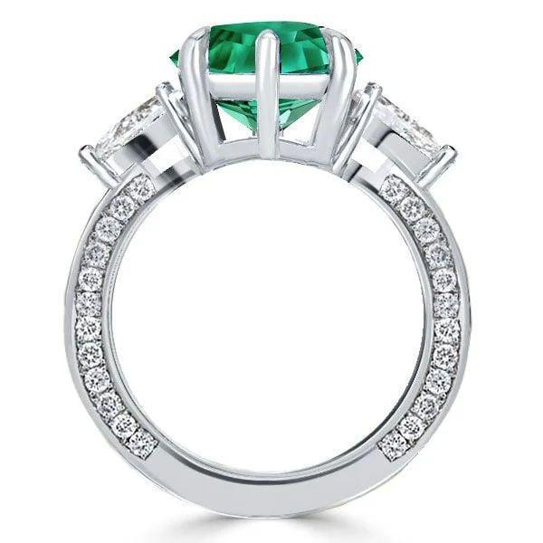 Emerald Cut Green Stone 3 Stone Engagement Ring in Rhodium Plated Sterling Silver