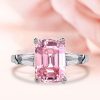 Three Stone Pink Emerald Cut Engagement Ring in Rhodium Plated Sterling Silver