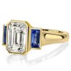 Golden Bezel Emerald Cut Three Stone Engagement Ring - 18K Gold Plated Sterling Silver