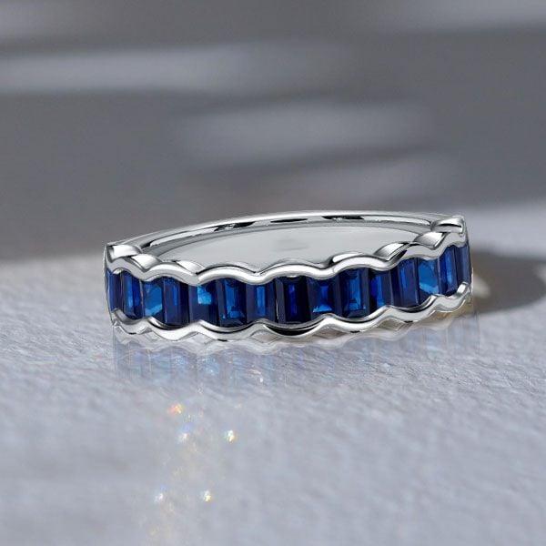 Channel Set Blue Sapphire Half Eternity Wedding Band in Sterling Silver