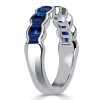 Channel Set Blue Sapphire Half Eternity Wedding Band in Sterling Silver
