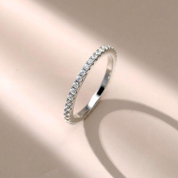 Sterling Silver Eternity Wedding Band - Round Cut Shared Prong - 0.56 CT. TW.