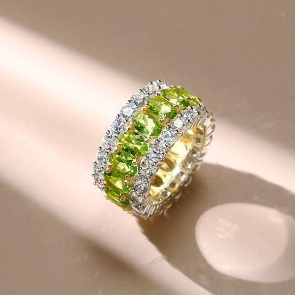 Oval Cut Peridot Wedding Band in Sterling Silver with Rhodium Plating