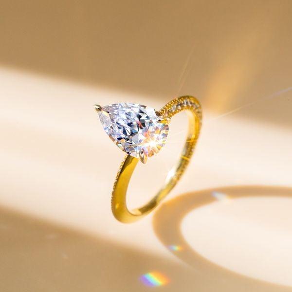 18K Gold Plated Pear Cut White Sapphire Engagement Ring with 2.61 CT. TW. Center Stone