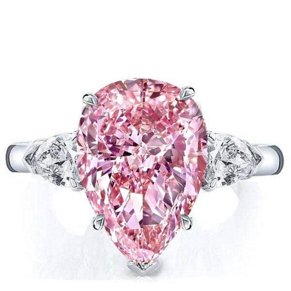 Created Pink Sapphire Three Stone Pear Engagement Ring in Rhodium Plated Sterling Silver
