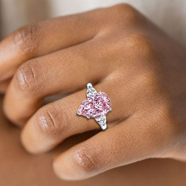 Created Pink Sapphire Three Stone Pear Engagement Ring in Rhodium Plated Sterling Silver