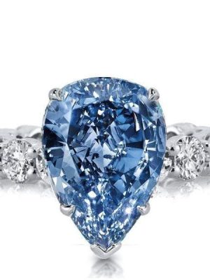 Pear Shaped Blue Topaz Eternity Wedding Ring in Rhodium-Plated Sterling Silver