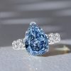 Pear Shaped Blue Topaz Eternity Wedding Ring in Rhodium-Plated Sterling Silver
