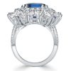 Emerald Cut Blue Sapphire Statement Ring in Rhodium Plated Sterling Silver