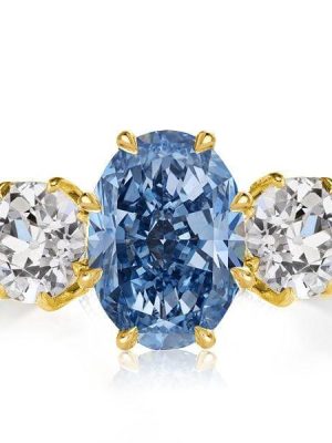 Oval Cut Blue Topaz Three Stone Engagement Ring in 18K Gold Plated Sterling Silver