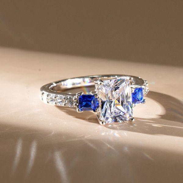 Radiant Cut White Sapphire Three Stone Engagement Ring in Sterling Silver