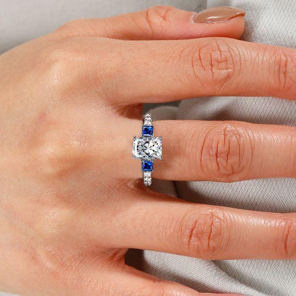 Radiant Cut White Sapphire Three Stone Engagement Ring in Sterling Silver