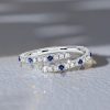 White & Blue Sapphire Spiral Wedding Band in Sterling Silver - 0.33 CT. TW.