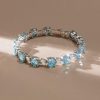 Alternating Aquamarine and White Sapphire Tennis Bracelet in Rhodium-Plated Sterling Silver