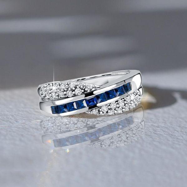 Micro Pave Asscher Cut Blue Sapphire Criss-Cross Wedding Band in Sterling Silver