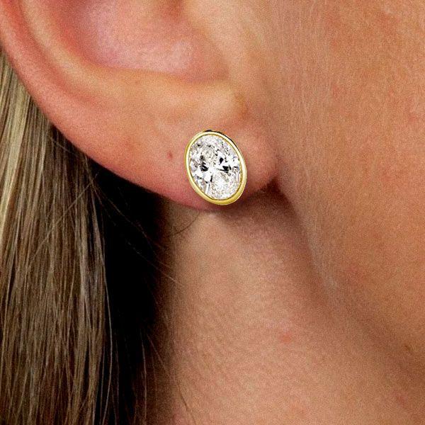 18K Gold Plated Oval Cut Stud Earrings with 2.50 CT. TW. Simulated Diamonds