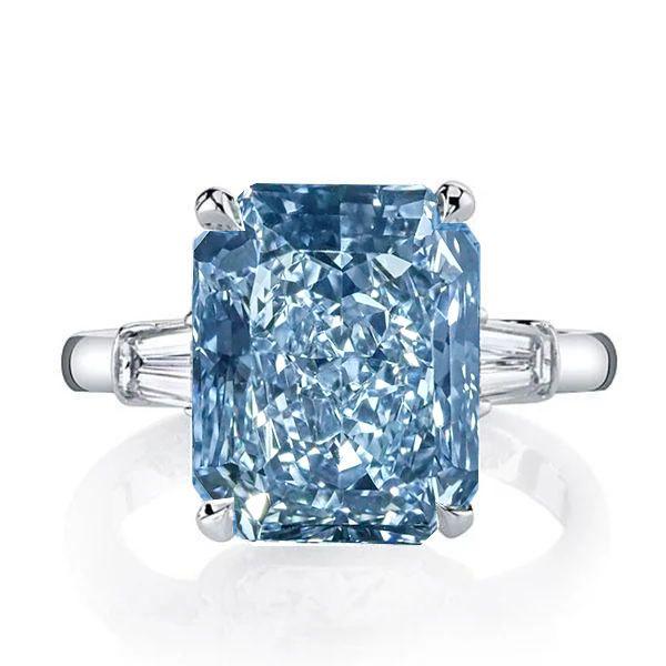 Radiant Cut Blue Topaz Three Stone Engagement Ring - Sterling Silver
