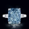 Radiant Cut Blue Topaz Three Stone Engagement Ring - Sterling Silver