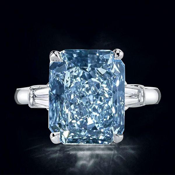 Radiant Cut Blue Topaz Three Stone Engagement Ring - Sterling Silver