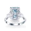 Radiant Cut Blue Topaz Three Stone Engagement Ring - Sterling Silver