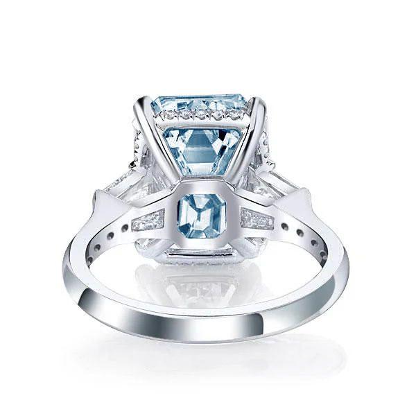 Radiant Cut Blue Topaz Three Stone Engagement Ring - Sterling Silver