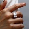 Three Stone Oval Created White Sapphire Engagement Ring in Rhodium Plated Sterling Silver