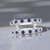 Round Cut White and Blue Sapphire Enhancer Wedding Band in Sterling Silver
