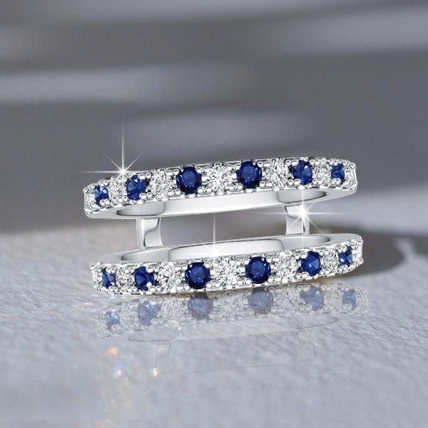 Round Cut White and Blue Sapphire Enhancer Wedding Band in Sterling Silver