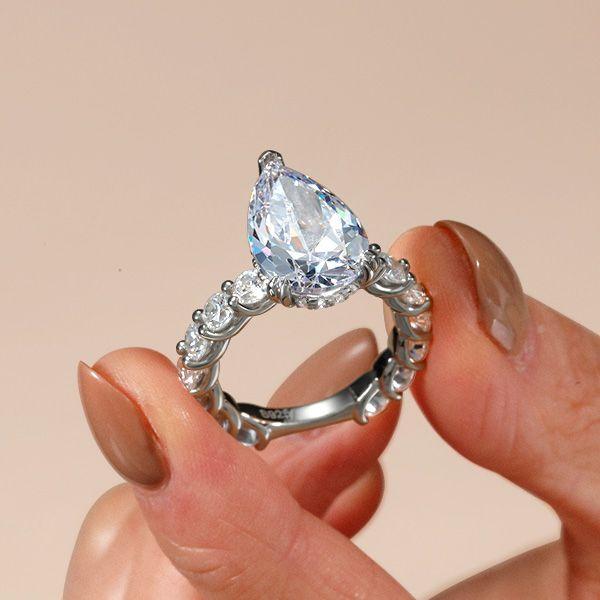 Pear & Round Cut Sterling Silver Engagement Ring - 0.75 Carat