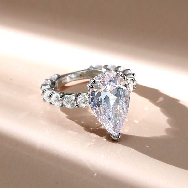 Pear & Round Cut Sterling Silver Engagement Ring - 0.75 Carat