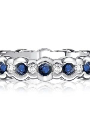 Channel Set White and Blue Sapphire Eternity Band Ring in Sterling Silver