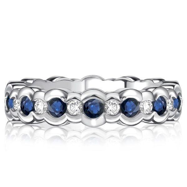 Channel Set White and Blue Sapphire Eternity Band Ring in Sterling Silver