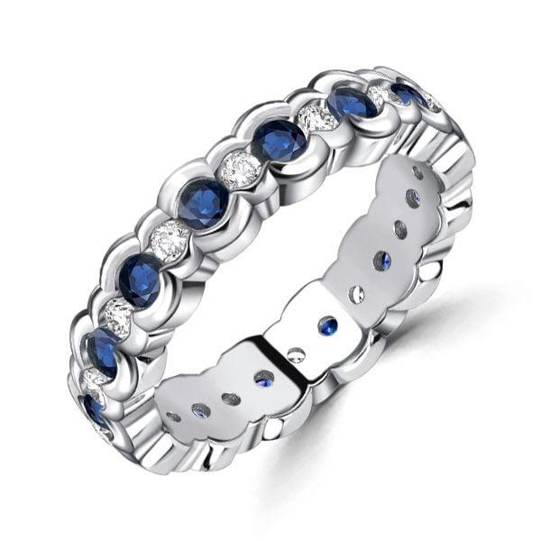 Channel Set White and Blue Sapphire Eternity Band Ring in Sterling Silver