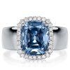 Cushion Cut Blue Topaz Halo Engagement Ring in Sterling Silver