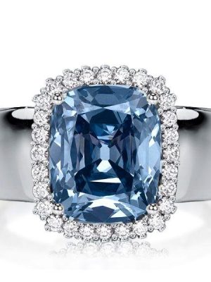 Cushion Cut Blue Topaz Halo Engagement Ring in Sterling Silver