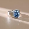 Cushion Cut Blue Topaz Halo Engagement Ring in Sterling Silver