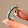 Emerald Green Round Cut Eternity Band in Sterling Silver