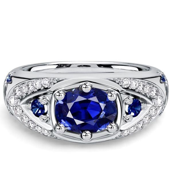 Oval Cut Blue Sapphire Halo Engagement Ring in Rhodium Plated Sterling Silver