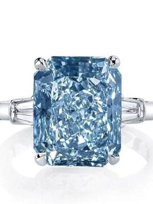 Three Stone Radiant Cut Blue Topaz Engagement Ring in Sterling Silver